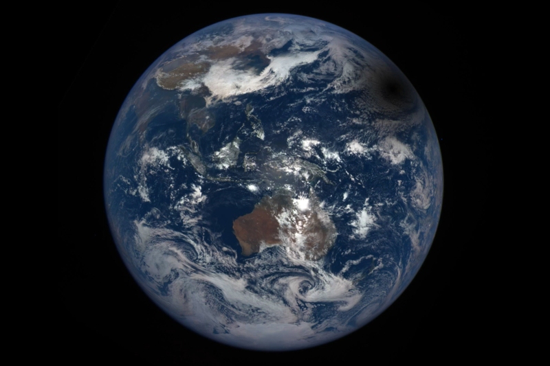 Illustration for article titled Earth Looks Bruised in the Shadow of the Eclipse